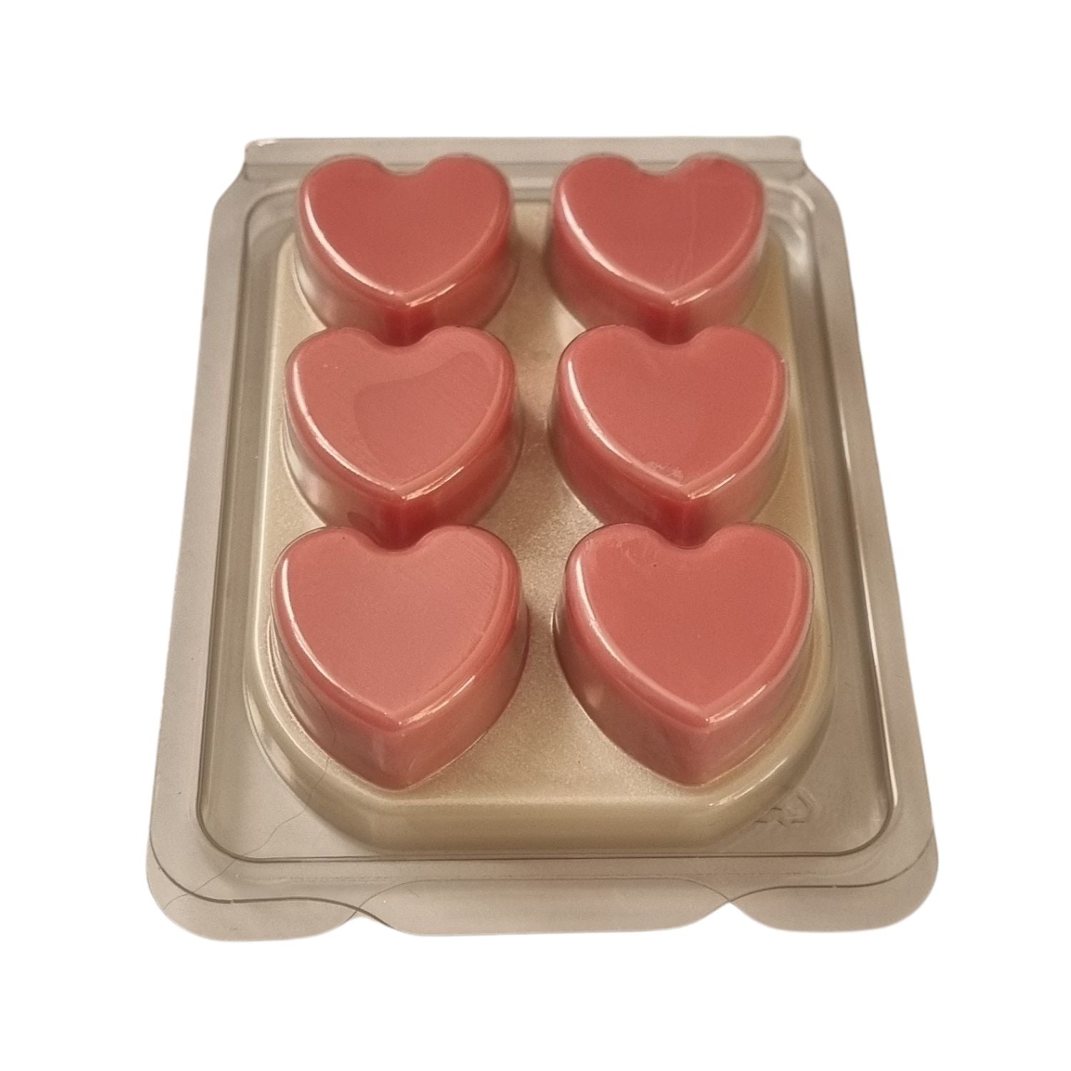 Scented Soy Wax Melts in hearts Clamshell with 6 soft pink Hearts on white wax melt background angled view