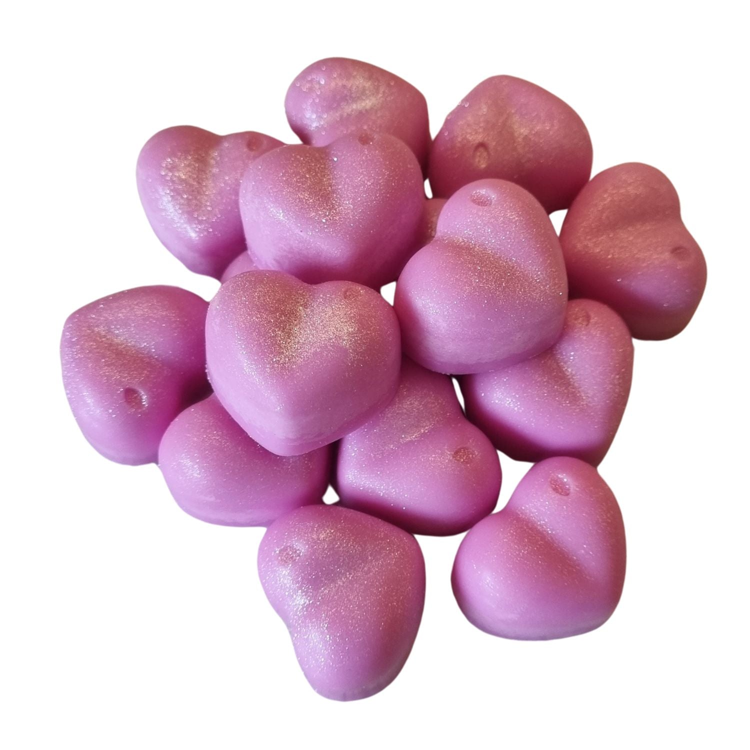 a group of pink heart shaped soy wax melts