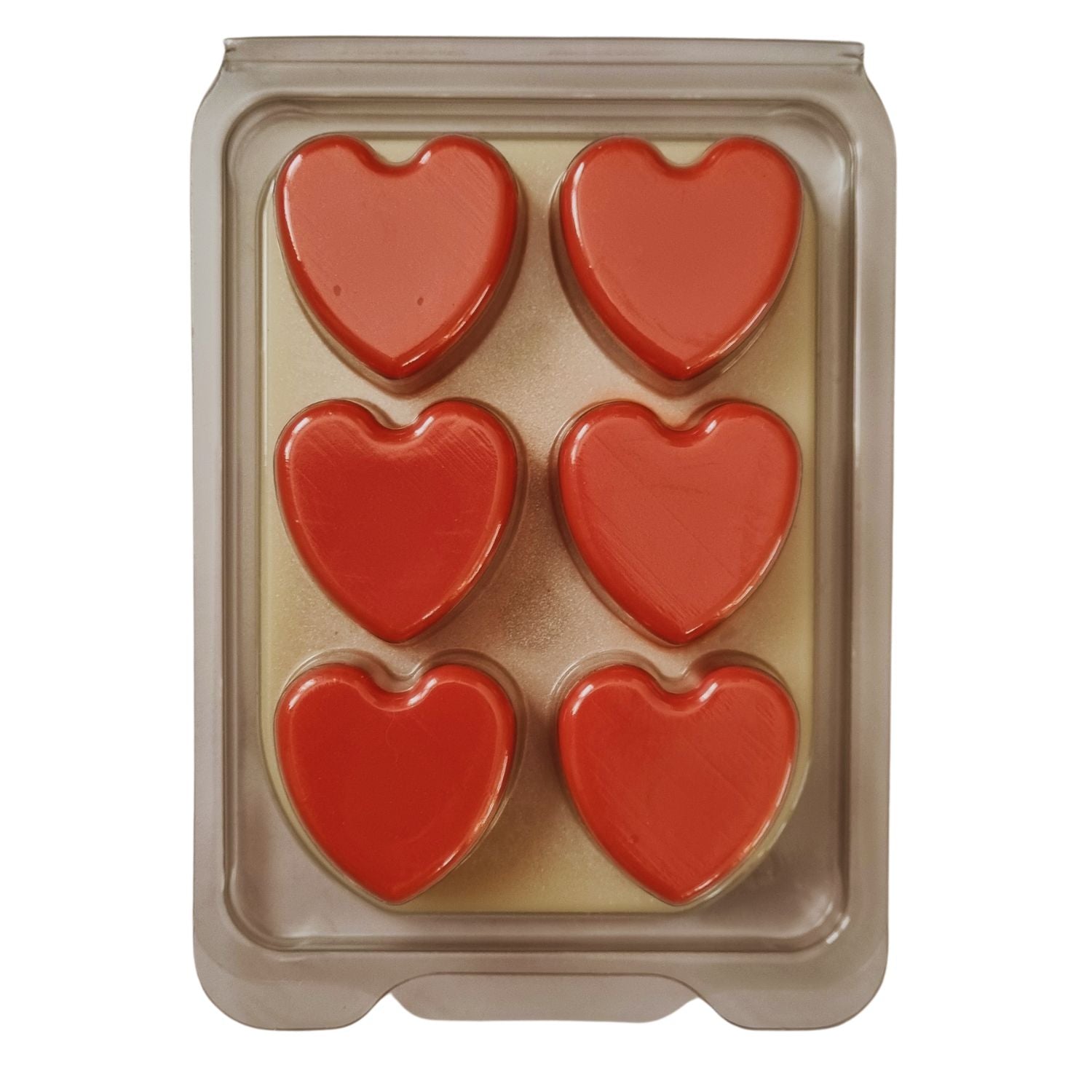 Scented Soy Wax Melts in hearts Clamshell with 6 red Hearts on white wax melt background