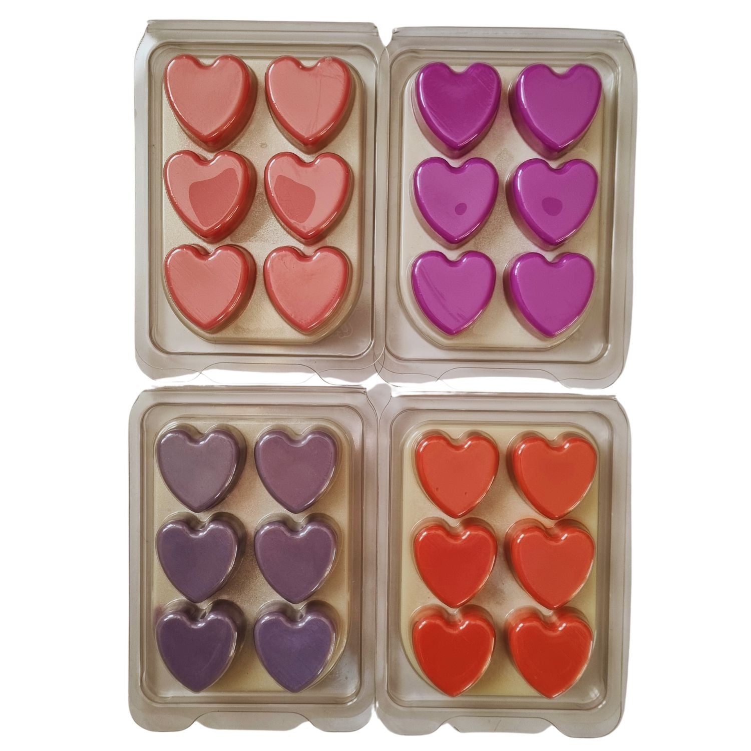 A group of 4 Scented Soy Wax Melts in 6 heart Clamshell with different coloured hearts