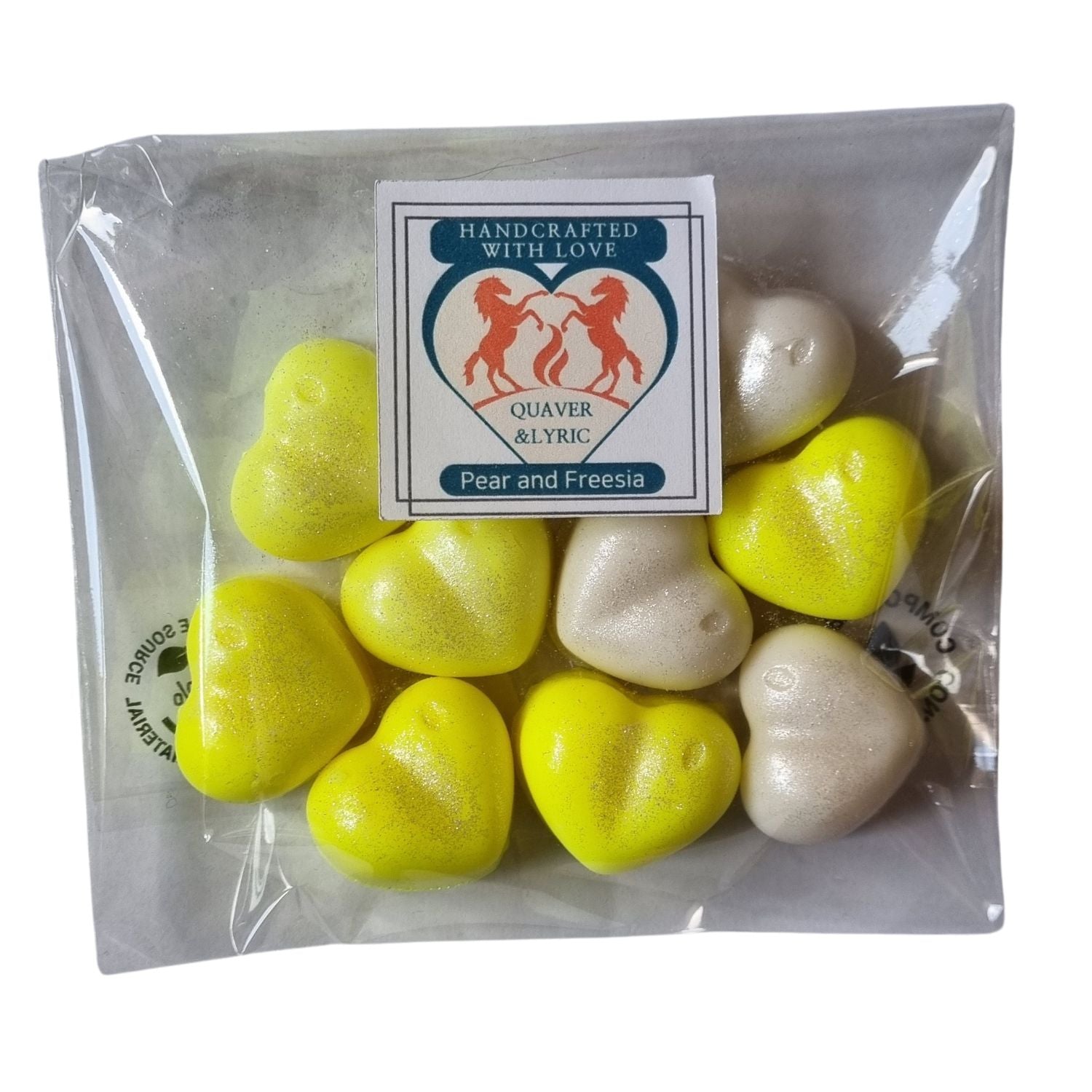 ten white and bright yellow heart shaped soy wax melts in a packet with Quaver and Lyric branding