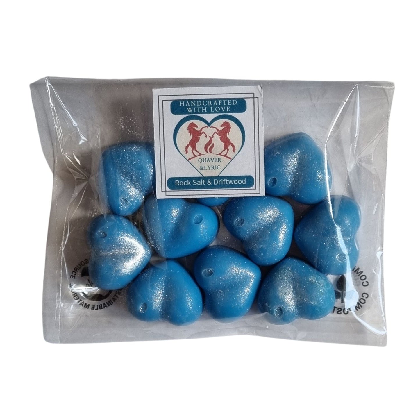 ten ocean blue heart shaped soy wax melts in a packet with Quaver and Lyric branding