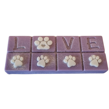 A violet Scented Wax Melt bar with love and white paw prints
