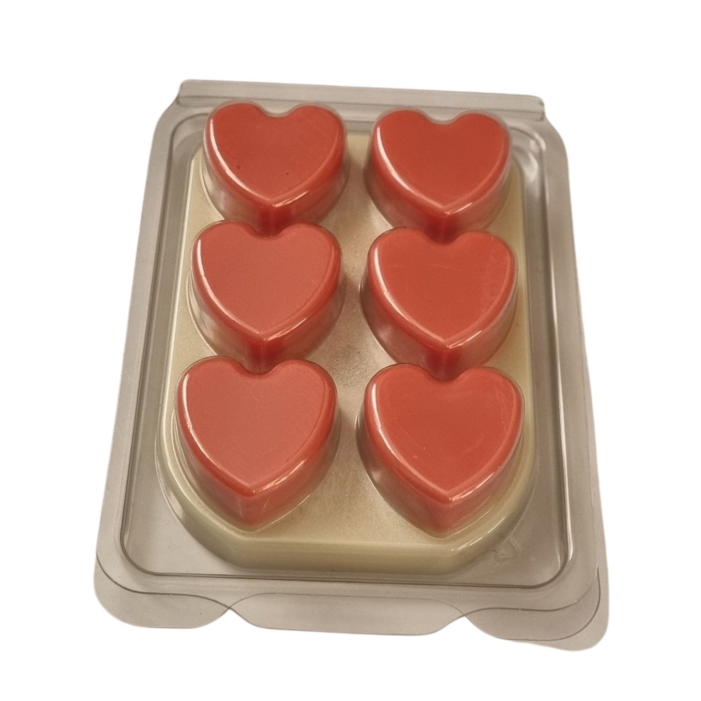 a wax melt bar in clamshell with 6 red hearts