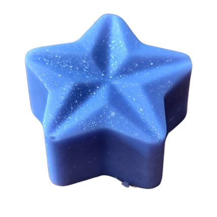 Quaver&Lyric’s Soy Wax Melt Stars (Pack of 15): Blue, star-shaped melts with a textured surface and subtle specks—handmade to add charm and fragrance to any space. Set against a white background.