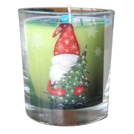 Father Christmas candle with father christmas holding a christmas tree design on the front of a scented candle in glass container